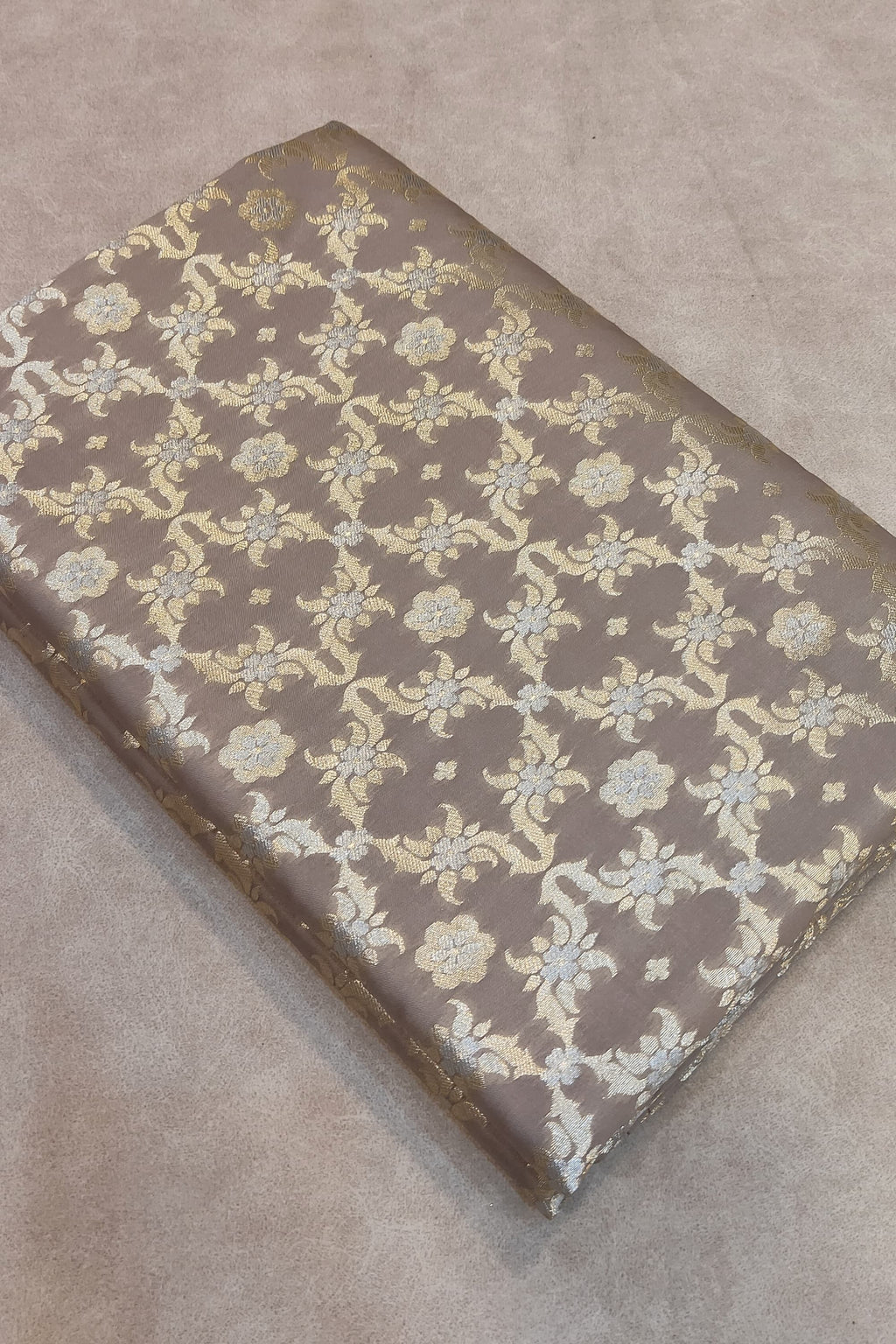 Book with a floral pattern on a beige surface