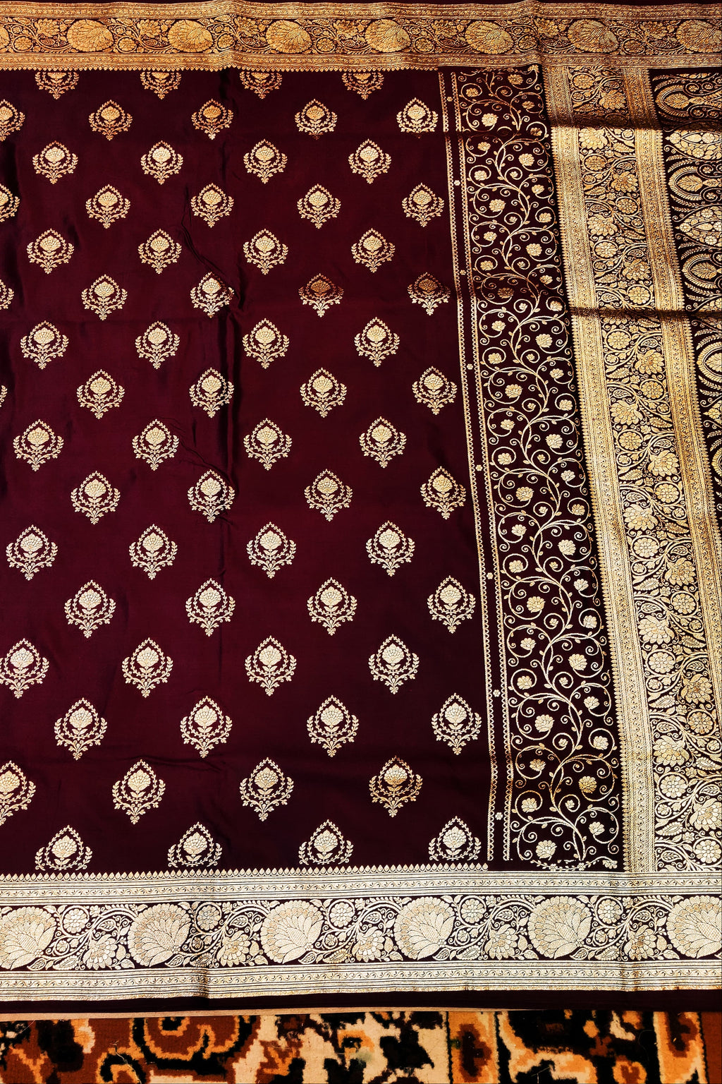 Decorative fabric with intricate patterns on a textured background
