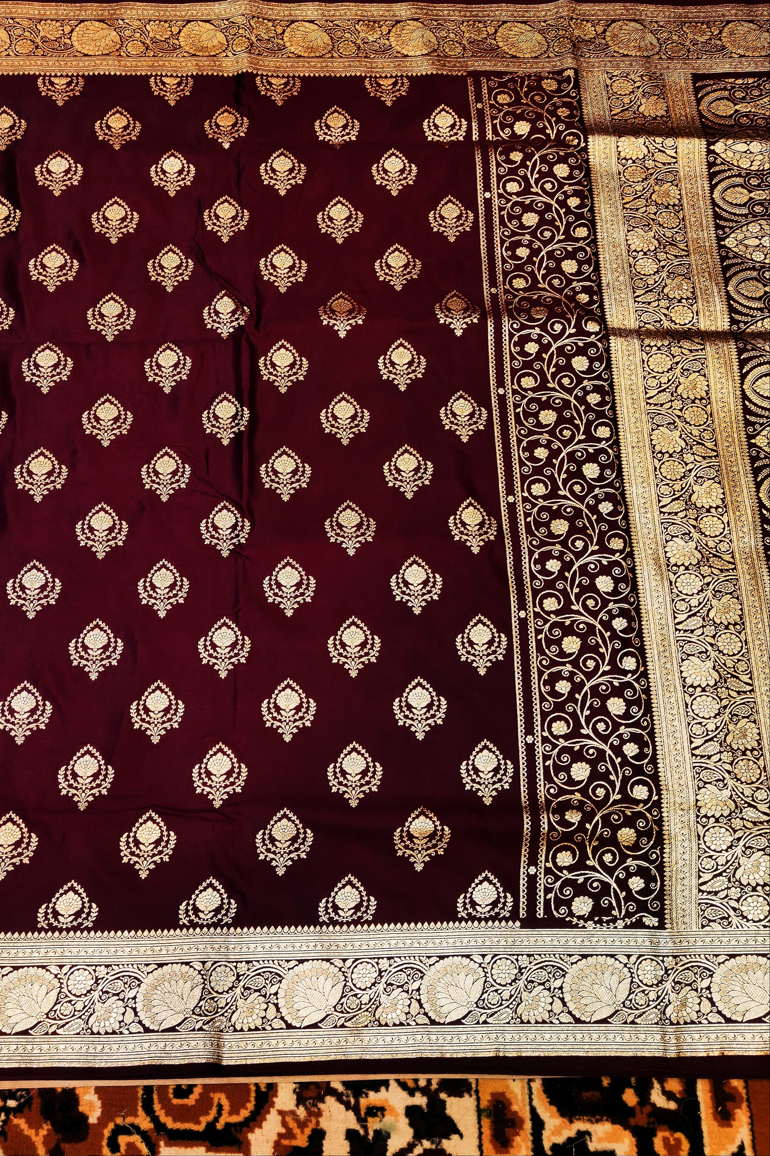 Decorative fabric with intricate patterns on a textured background