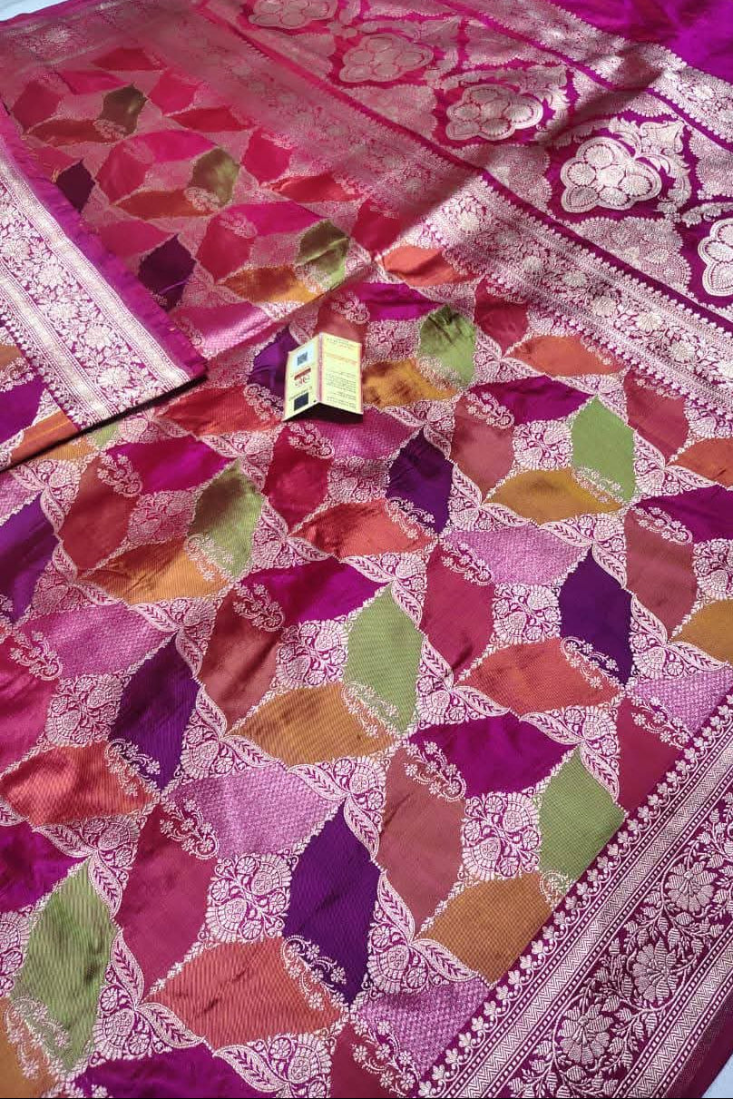 Colorful quilt with geometric pattern on a white background