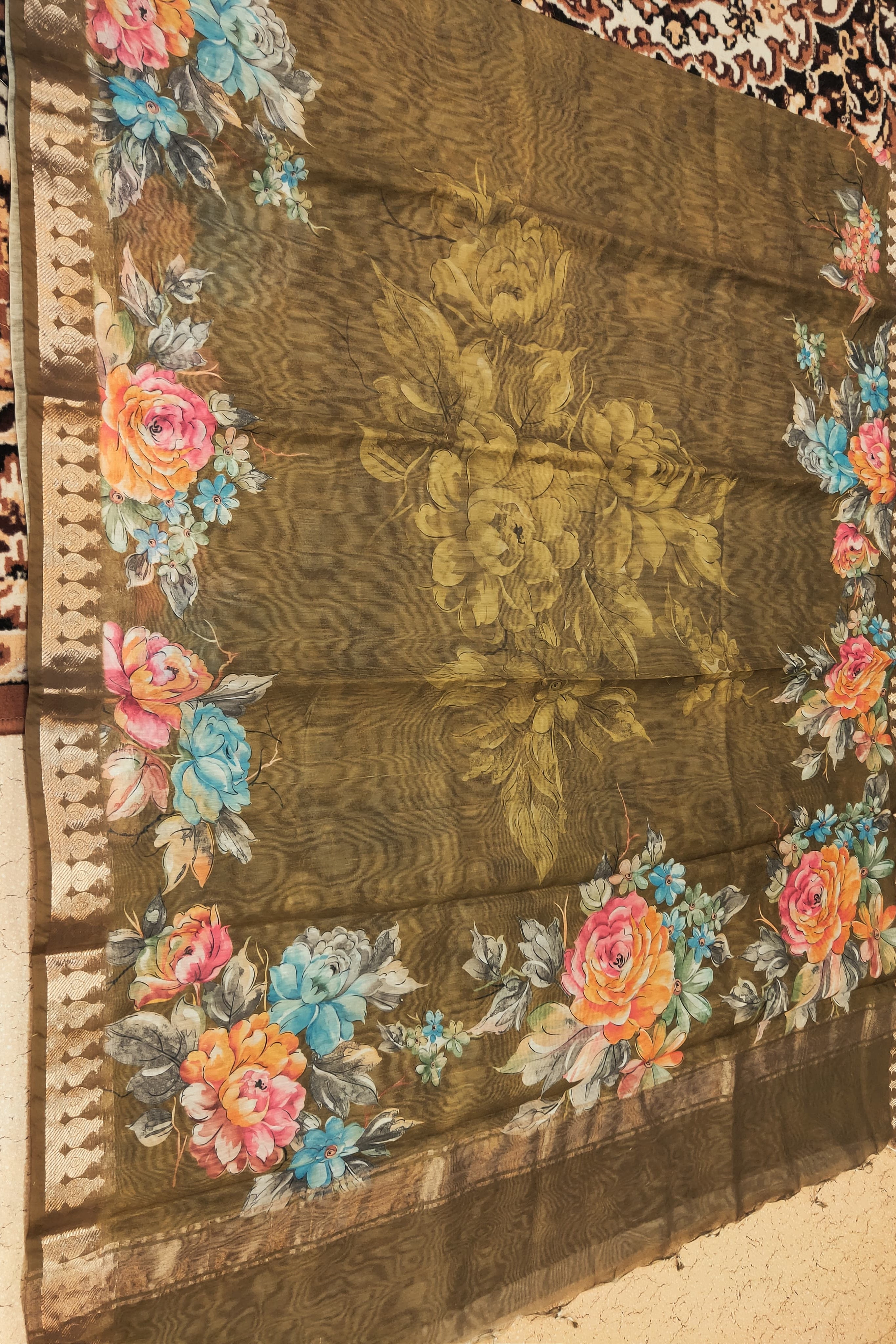 Decorative fabric with floral patterns on a brown background