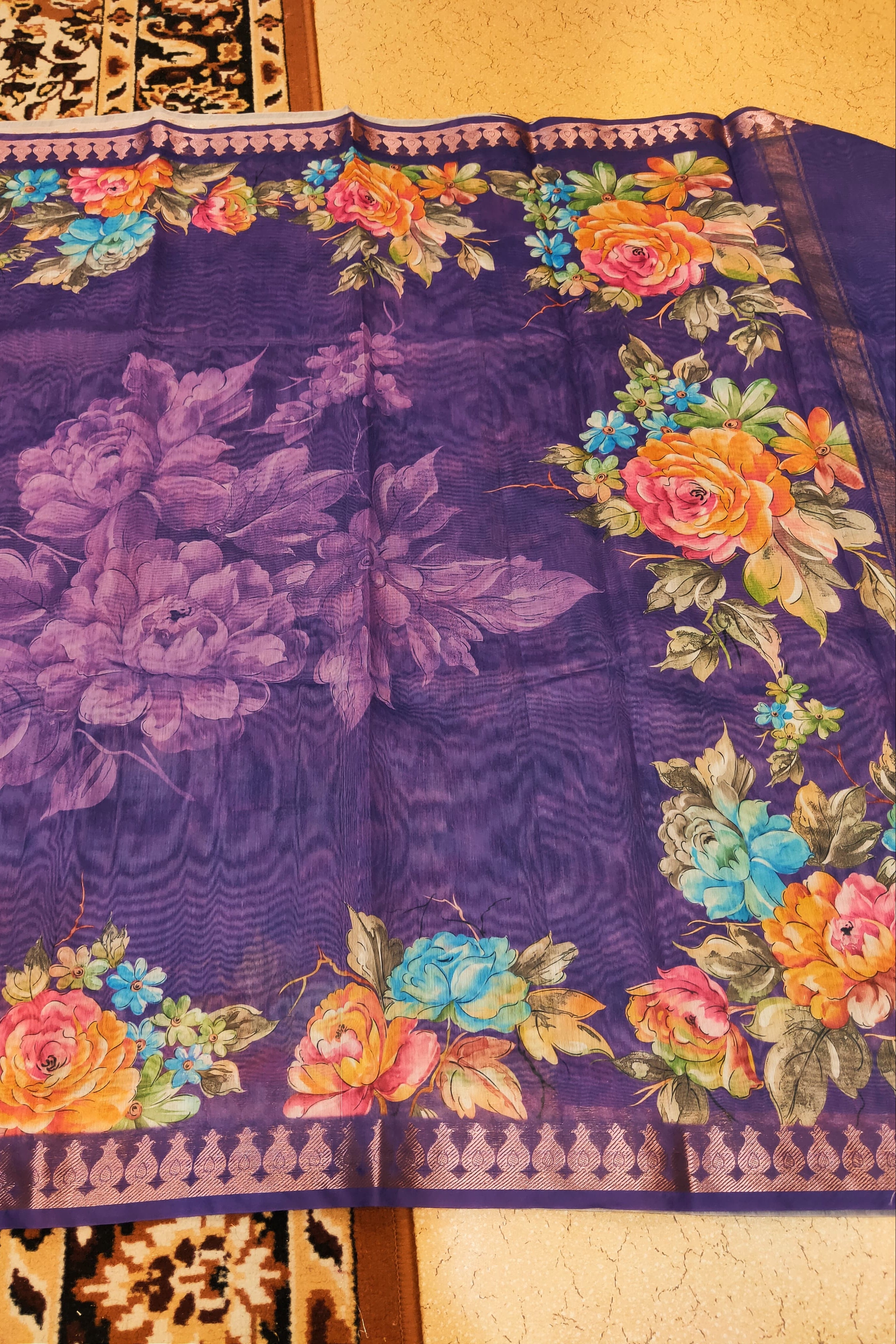 Floral-patterned fabric with a purple background