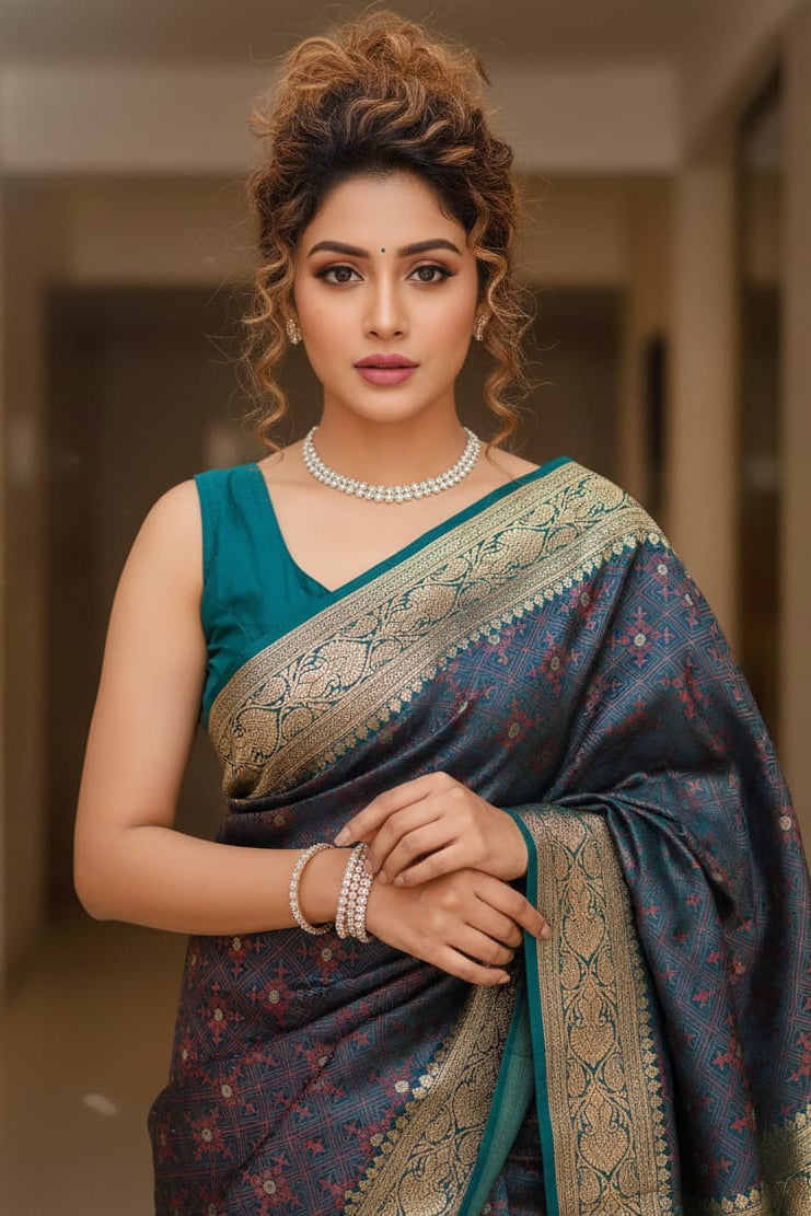 Woman wearing a traditional saree with a blurred background